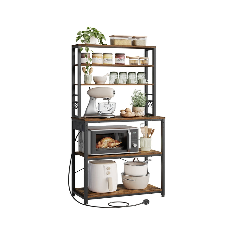 Rustic brown kitchen baker's rack with power outlet, styled with appliances