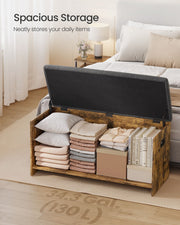 Open storage bench in a bedroom holding folded clothes, pillows and books, 130 litre capacity