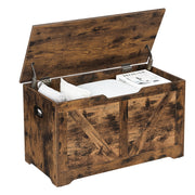 Rustic brown Vasagle storage chest with lid open showing blankets, pillows and a magazine inside