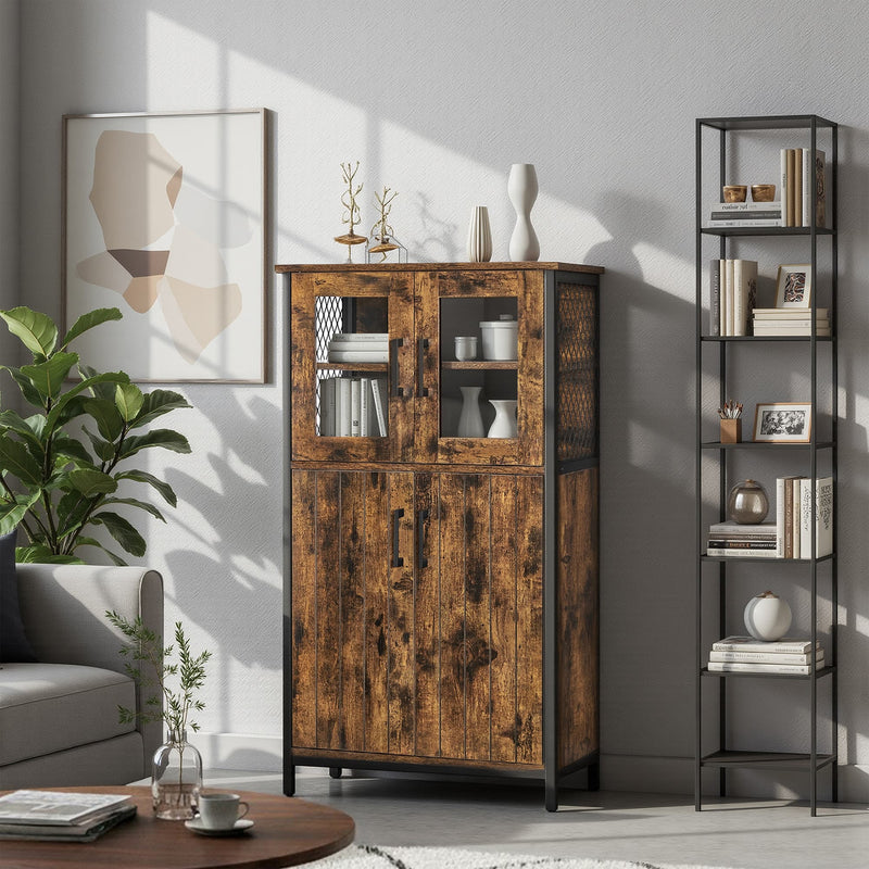 Storage cabinet in a kitchen setting holding books, a vase and a plant on top