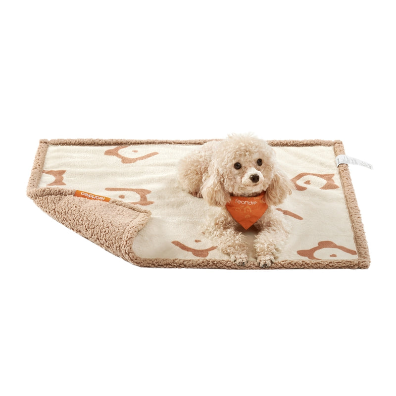 Feandrea small beige waterproof sherpa fleece dog blanket with a small dog sitting on it