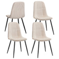 Set of 4 cream white chenille dining chairs with black metal legs on a plain background