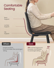 Woman sitting on a slate grey dining chair showing the 105 degree inclined backrest