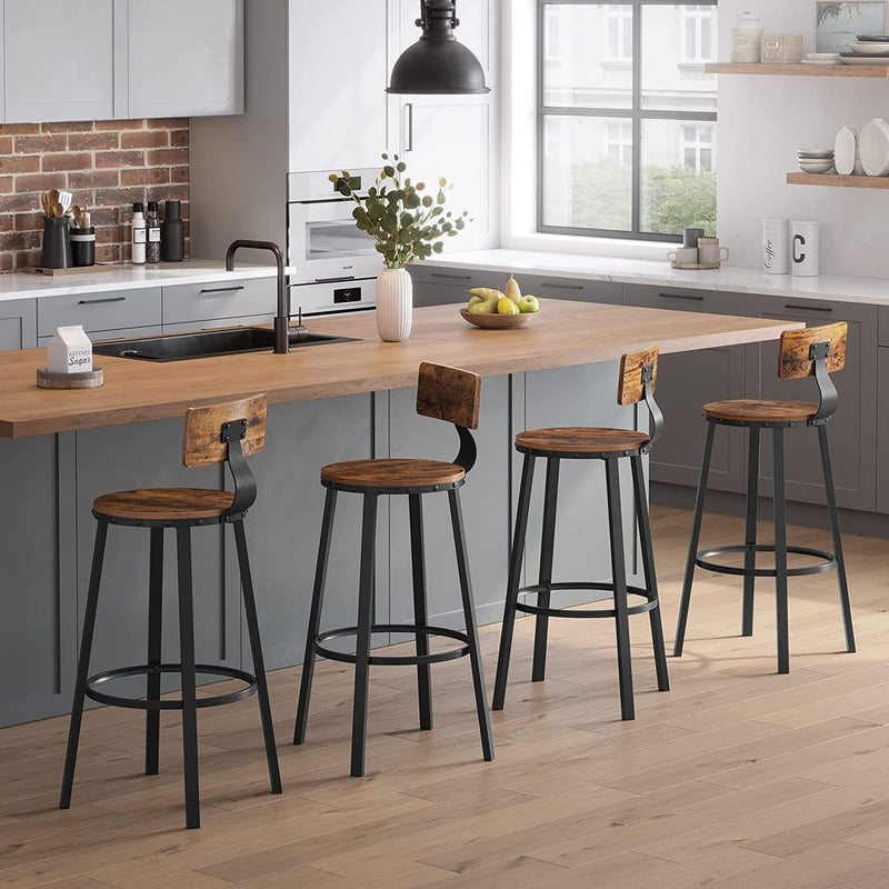 Four brown bar stools lined up along a grey kitchen island