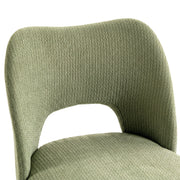 Close-up of the green chenille backrest cut-out and fabric texture