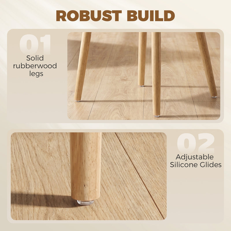 Close-up of solid rubberwood legs and adjustable silicone glides on the beige chairs