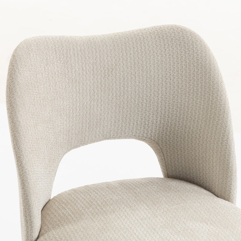 Close-up of the beige chenille backrest cut-out and fabric texture