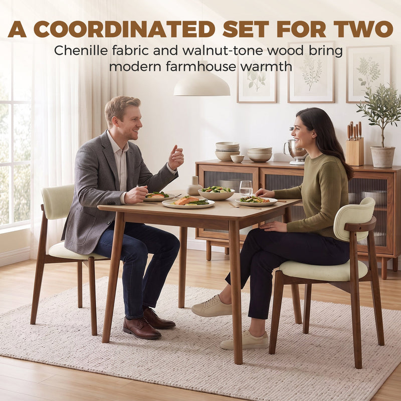 Couple eating at a dining table with two beige chenille chairs