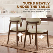 Two beige armless dining chairs tucked under a wooden table