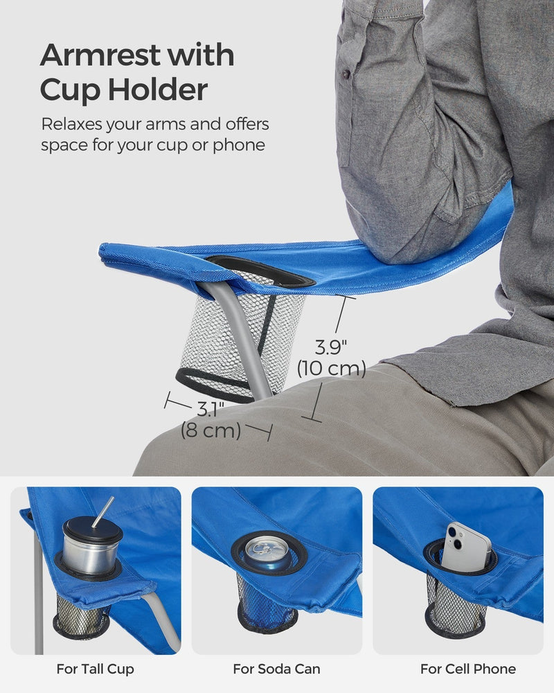 Close-up of the armrest cup holder shown holding a tall cup, a soda can and a mobile phone