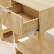 Close-up of the open bedside table drawer showing the glide rail