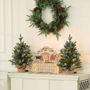 2ft set of two Christmas trees on a mantel with a wreath and wooden advent calendar