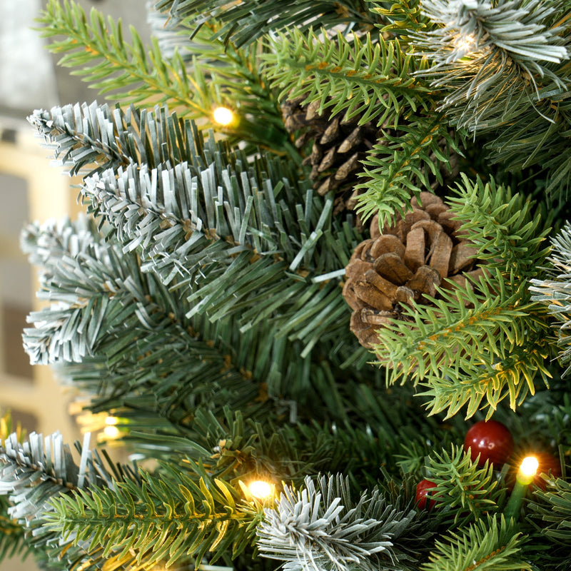 3ft set Christmas tree close-up of frosted tips with a pinecone and berry
