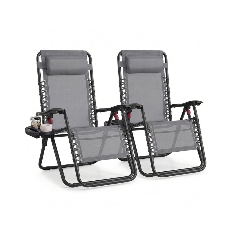 Pair of dark grey zero gravity chairs with mesh seats and sliding headrest pillows