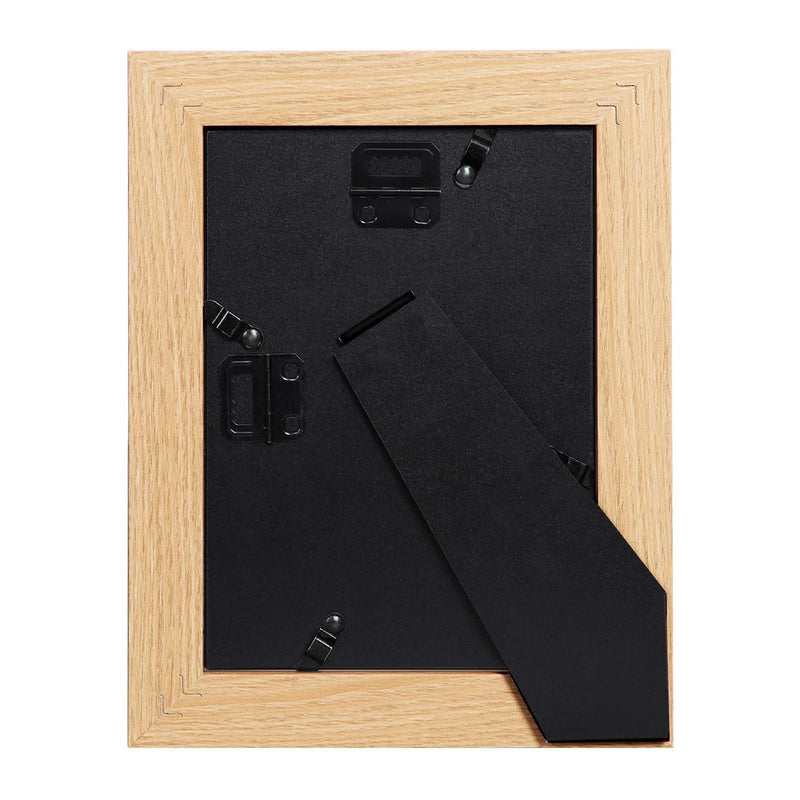 Rear view of a frame showing the black backing board, metal retaining clips and the fold-out stand