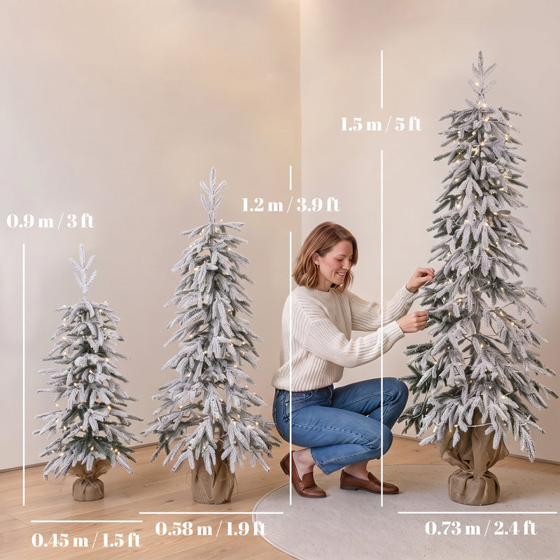 Height and diameter diagram showing 0.9 m, 1.2 m and 1.5 m trees with a woman adjusting a branch