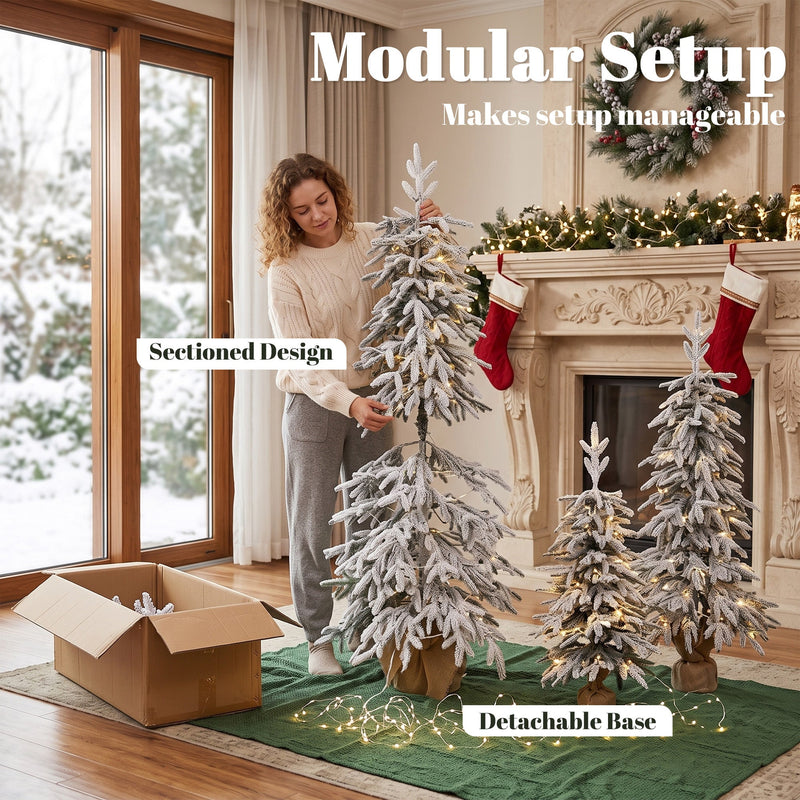 Woman assembling a sectioned flocked tree beside an open box with detachable base callout