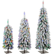 Set of 3 snow-flocked Christmas trees with multicolour lights on black metal stands