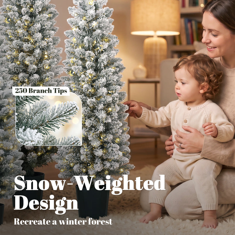 Toddler touching a flocked branch beside a 250 branch tips callout
