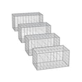 Studio shot of 4 empty galvanised steel gabion cages in a row