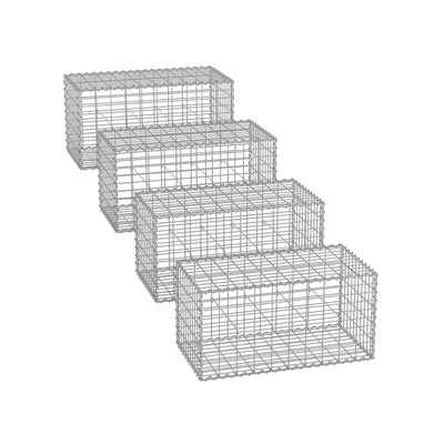 Studio shot of 4 empty galvanised steel gabion cages in a row
