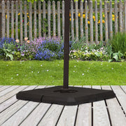 Parasol base weights assembled beneath a cross-base parasol stand on a garden deck