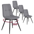 Set of 4 slate grey velvet dining chairs with black metal legs and a 360 degree swivel arrow