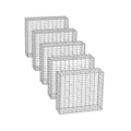 Studio shot of 5 empty galvanised steel gabion cages in a row