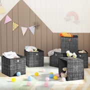Fabric storage cubes in a playroom holding soft toys and colourful balls