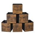 Six rustic brown and black fabric storage cubes stacked in a pyramid