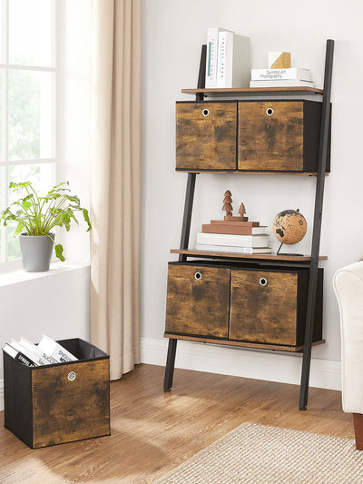 Brown storage cubes filling a ladder shelving unit in a living room, one on the floor