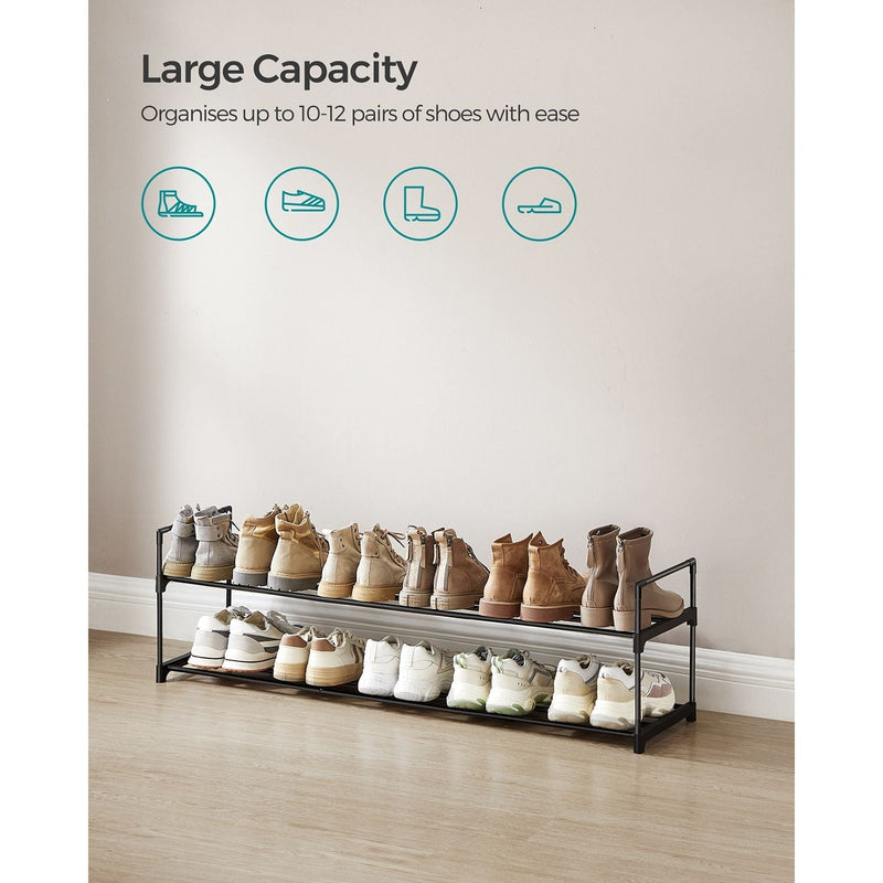 Songmics shoe shelf holding rows of boots and trainers across two tiers