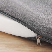 Close-up of the seat cushion zip opened to show the white foam filling inside