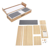 Flat-pack contents laid out with wood panels, seat cushion, fittings pack and instruction manual