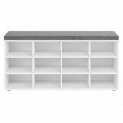 Front view of empty white shoe storage bench with grey cushion