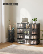 Shoe storage box shown with front door open holding a pair of shoes