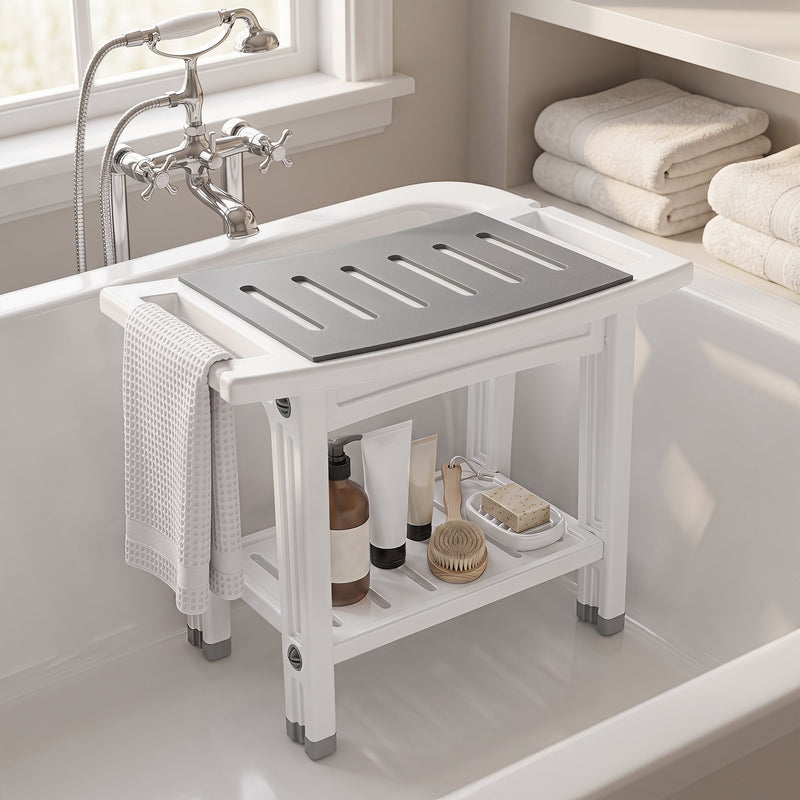 Shower stool placed inside a white bath with a towel over the side and toiletries on the shelf