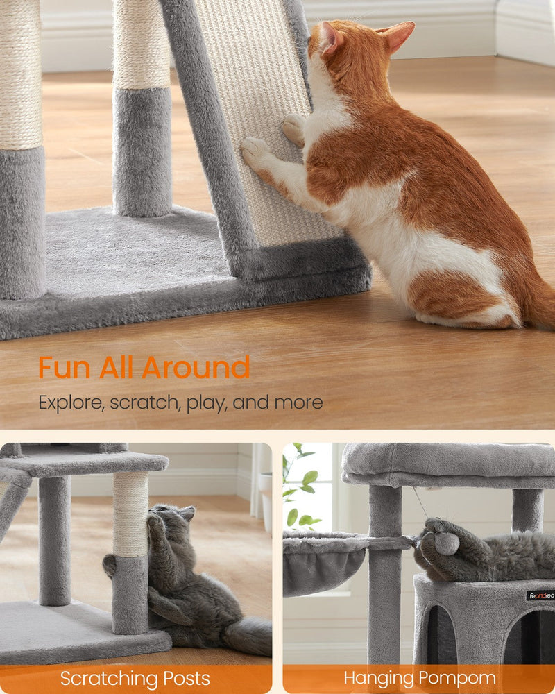 Cats using the sisal scratching ramp, the wrapped scratching posts and the hanging pompom toy