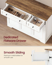 Close-up of the open cutlery drawers and metal slides on the cloud white sideboard