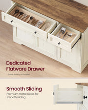 Close-up of the open cutlery drawers and metal slides on the rustic white sideboard