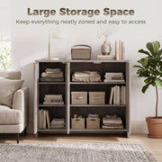 Grey sideboard with all 3 doors open showing folded blankets, books and storage boxes on the shelves