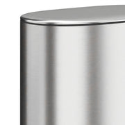 Close-up of the brushed stainless steel lid and body of the pedal bin