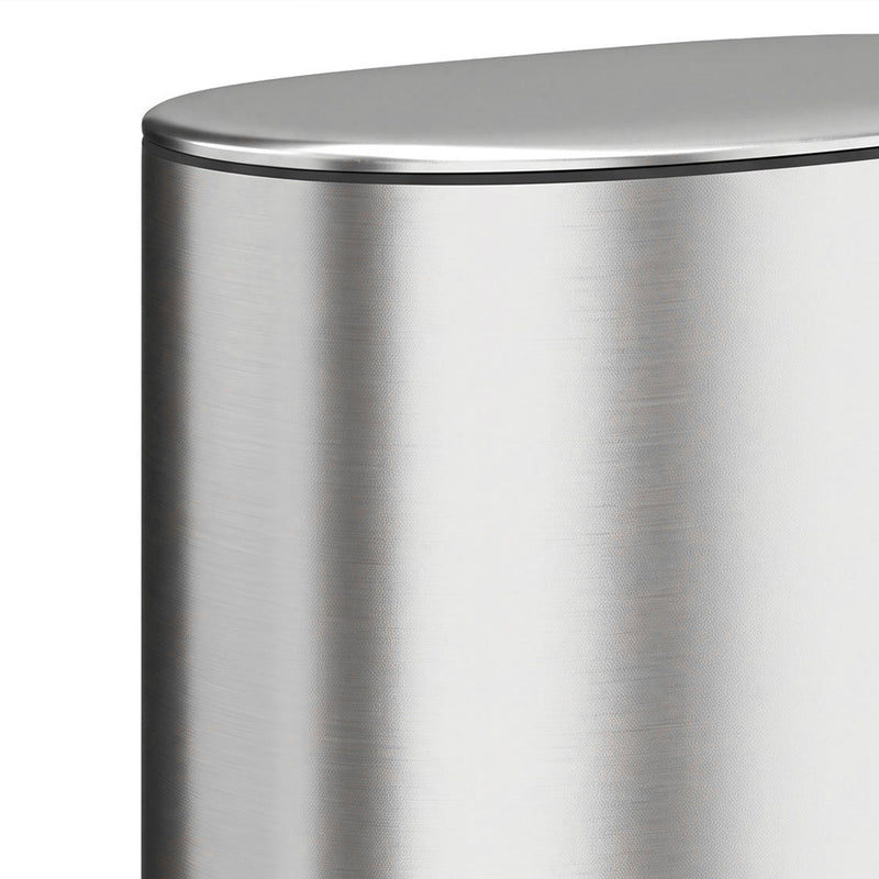 Close-up of the brushed stainless steel lid and body of the pedal bin