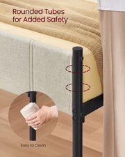 Close-up of a rounded black tube leg next to the beige upholstered side rail, with an inset of a hand wiping the tube clean