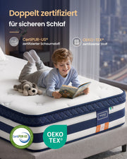 Boy reading on the mattress with the CertiPUR-US and OEKO-TEX certification marks shown beside the navy and white quilted edge