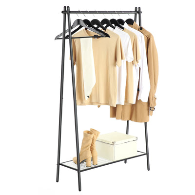 Black single rod garment rack holding shirts and a jacket with boots on the mesh shelf