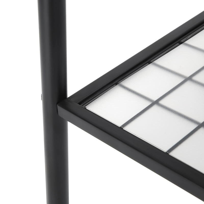 Close-up of the mesh bottom shelf with its plastic panel and black steel leg