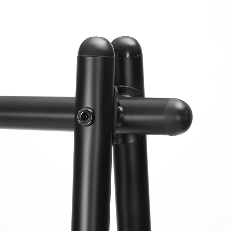 Close-up of the black steel connector joint where the rack poles meet