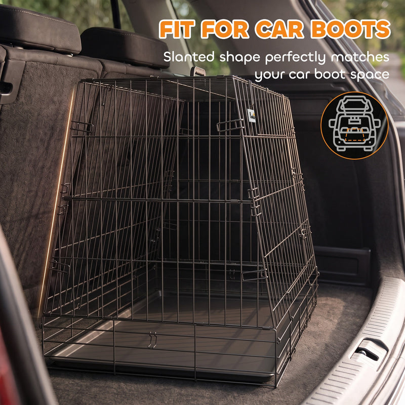 Slanted crate sitting flush against the rear seats inside a dark car boot