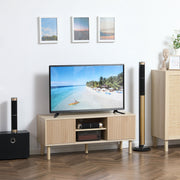 Lifestyle photo of the oak TV cabinet stand in a living room with a TV and soundbar on top